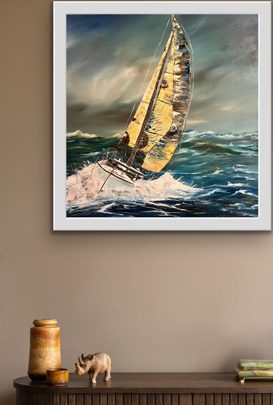 A Limited Edition Irish Print a dramatic seascape capturing the thrill of sailing in high winds. Bold, powerful, and full of movement hanging on a wall.